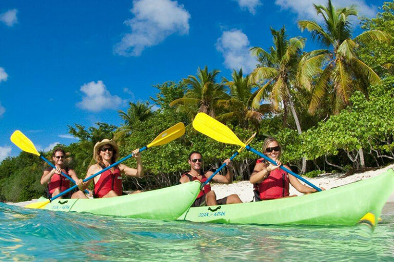 A group of vacationers kayaking with Caneel Bay Kayak, Hike, and Snorkel Tour in St. John, US Virgin Islands